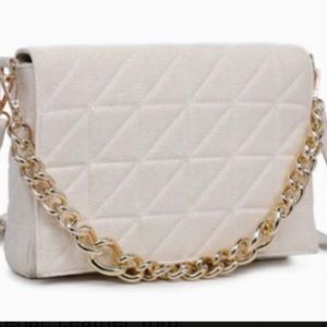 Ivory quilted cross body purse